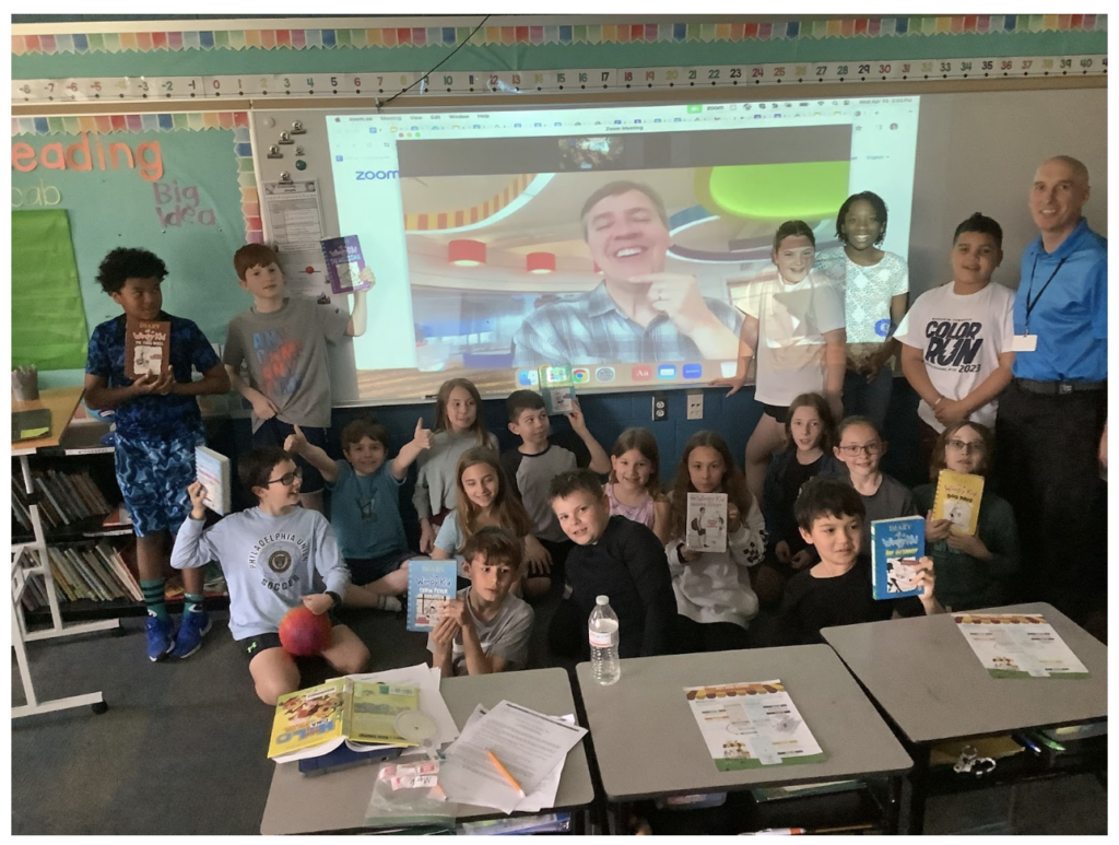 Bucher students smiling with the author on Zoom